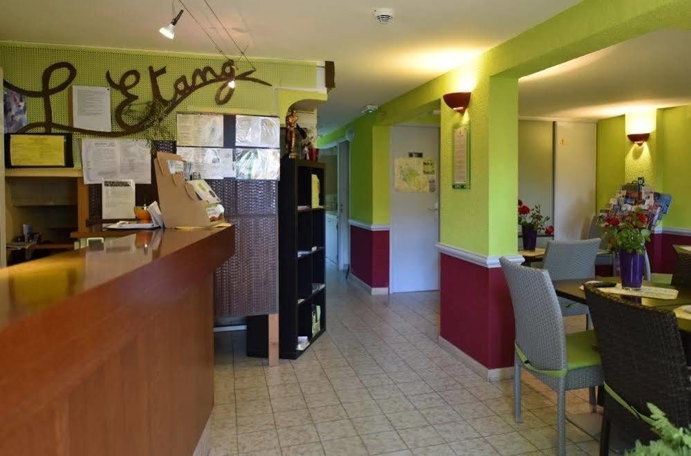 Logis Hotel De L'Etang Кюкюрон Екстериор снимка